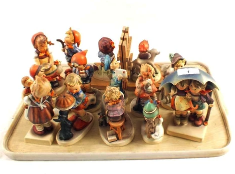 Hand-Carved Wooden Figurines or Hummel Figurines